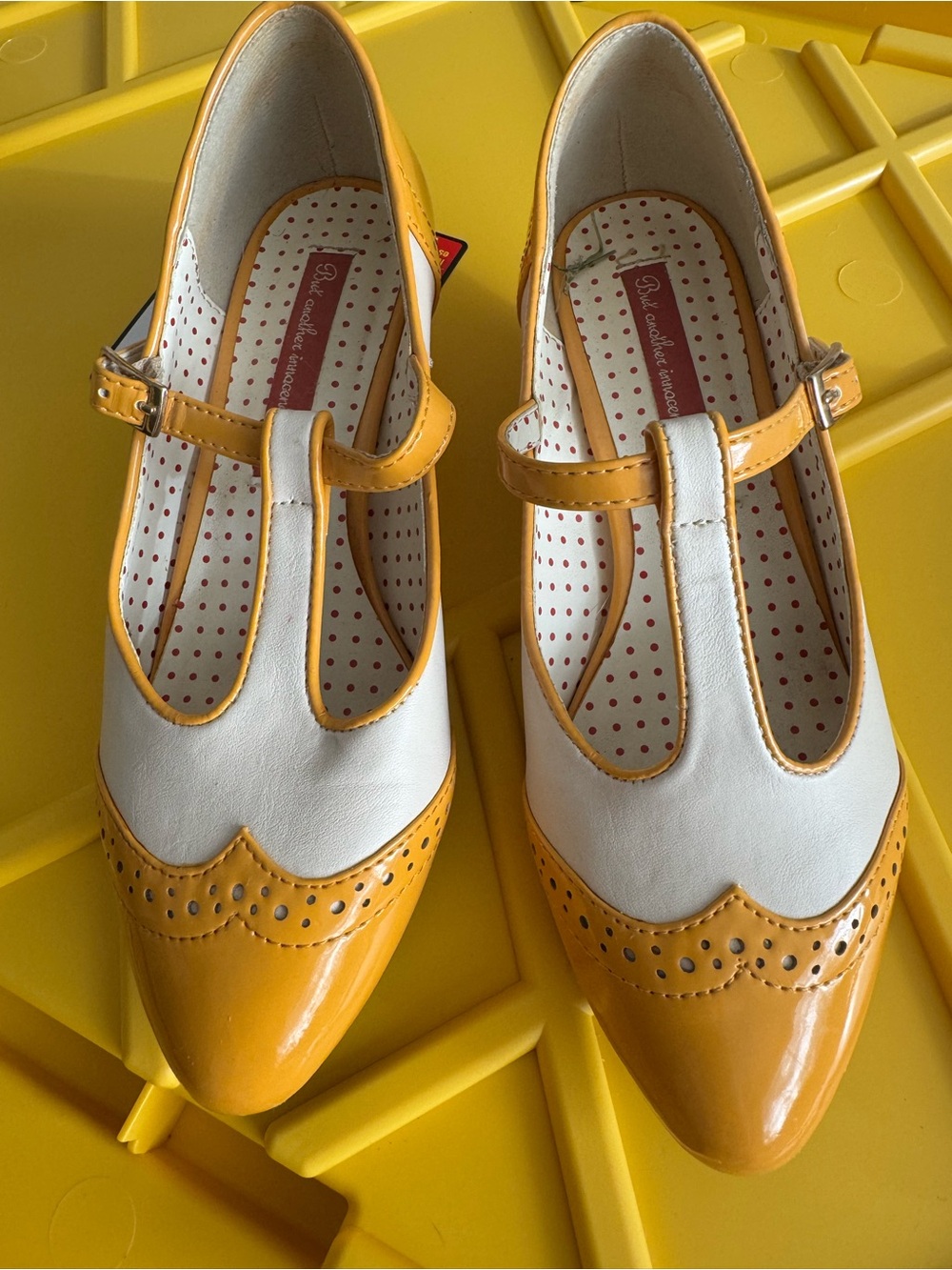 Vintage Inspurws Two-Tone T-Strap Dress Shoes in Yellow and White